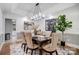Elegant dining room with stylish chandelier, seating for six, and decorative accents at 361 Nance Rd, Stanfield, NC 28163