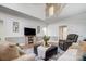 Inviting living room featuring a staircase, stylish decor, and ample seating for entertaining guests at 361 Nance Rd, Stanfield, NC 28163
