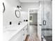 Bathroom with double vanity, quartz counters, and glass-enclosed shower at 3957 Miller Rd, Salisbury, NC 28147