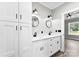 Bathroom with double vanity, quartz counters, and view into bedroom at 3957 Miller Rd, Salisbury, NC 28147