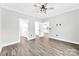 Wood-floored bedroom with access to an en suite bathroom and kitchen at 3957 Miller Rd, Salisbury, NC 28147