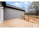 View of the wooden deck under construction showcasing the home's exterior and natural surroundings at 3957 Miller Rd, Salisbury, NC 28147
