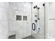 Walk in shower with grey tile walls and black shower head at 3957 Miller Rd, Salisbury, NC 28147