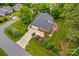 Beautiful aerial view of a well-maintained home with lush landscaping and a spacious driveway at 4159 Isle Of Pines Dr, Denver, NC 28037