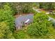Charming aerial view featuring mature landscaping, a brick facade, and a welcoming entrance at 4159 Isle Of Pines Dr, Denver, NC 28037