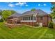 A beautiful brick home with a spacious backyard and outdoor patio, perfect for entertaining at 4159 Isle Of Pines Dr, Denver, NC 28037