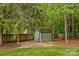 A well-maintained backyard featuring a shed, providing extra storage space at 4159 Isle Of Pines Dr, Denver, NC 28037