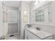 Bathroom featuring a granite vanity, a square mirror and natural light at 4159 Isle Of Pines Dr, Denver, NC 28037
