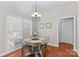 Dining area featuring a chandelier and large window at 4159 Isle Of Pines Dr, Denver, NC 28037