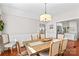 Dining room with wood table and chairs; view of kitchen at 4159 Isle Of Pines Dr, Denver, NC 28037