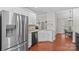 Kitchen featuring stainless steel refrigerator and farmhouse sink at 4159 Isle Of Pines Dr, Denver, NC 28037