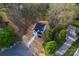 Charming home with new roof on a large lot featuring a long driveway and mature trees at 4219 Brownwood Nw Ln, Concord, NC 28027
