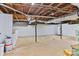 Unfinished basement featuring concrete floor, open ceiling and painted walls; ready for customization at 4445 Pioneer Dr, Hickory, NC 28601