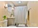 Bathroom view of the vanity, shower and toilet at 4445 Pioneer Dr, Hickory, NC 28601