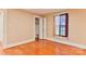 Bright bedroom featuring hardwood floors and a window with natural light at 4445 Pioneer Dr, Hickory, NC 28601
