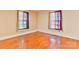 Bedroom showcasing hardwood floors and natural light from a window at 4445 Pioneer Dr, Hickory, NC 28601