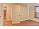 Bedroom view showing hardwood floors, window and doorway at 4445 Pioneer Dr, Hickory, NC 28601