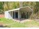 Covered carport featuring steel framing and ample parking in a private backyard at 4445 Pioneer Dr, Hickory, NC 28601
