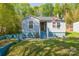 Charming home featuring an inviting front porch, new paint, and a well-manicured front yard at 4445 Pioneer Dr, Hickory, NC 28601