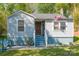 Charming home featuring an inviting front porch, new paint, and a well-manicured front yard at 4445 Pioneer Dr, Hickory, NC 28601
