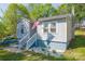 Charming home featuring an inviting front porch, new paint, and mature landscaping at 4445 Pioneer Dr, Hickory, NC 28601