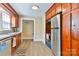 Traditional kitchen features wood cabinets, stainless steel appliances, and updated flooring at 4445 Pioneer Dr, Hickory, NC 28601