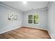 Bright bedroom offers natural light through a large window and features neutral walls for a cozy feel at 4607 Crewe Hall Ln, Waxhaw, NC 28173