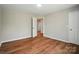 Bedroom features durable floors, neutral walls and open door to closet at 4607 Crewe Hall Ln, Waxhaw, NC 28173