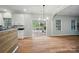 The open dining area flows into the kitchen and offers access to the patio, blending indoor and outdoor living at 4607 Crewe Hall Ln, Waxhaw, NC 28173