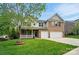 Beautiful exterior featuring a home with a well-kept lawn and a two-car garage at 4607 Crewe Hall Ln, Waxhaw, NC 28173