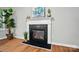 Close-up view of a fireplace, adding warmth and character to this inviting living space at 4607 Crewe Hall Ln, Waxhaw, NC 28173