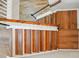Aerial shot of staircase with brown steps and white bannisters, connecting multiple levels at 4607 Crewe Hall Ln, Waxhaw, NC 28173