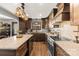 Well-equipped kitchen with granite countertops, stainless steel appliances, and ample cabinet space at 466 Shoreline Rd, New London, NC 28127