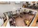 Open-concept living room with hardwood floors, natural light, and a view of the dining area at 466 Shoreline Rd, New London, NC 28127