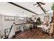 Spacious loft-style living room boasting wooden beams, hardwood floors, and natural light at 466 Shoreline Rd, New London, NC 28127