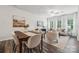 Open concept living and dining area provides natural lighting and comfortable seating at 4754 Lakeview N Rd # 19, Charlotte, NC 28216