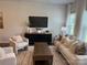 Inviting living room with neutral tones, modern furniture, and lots of natural light at 5103 Orchardview Way # 27, Charlotte, NC 28216