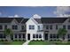 Charming townhome features a welcoming entrance, complemented by manicured landscaping at 5115 Orchardview Way # 24, Charlotte, NC 28216