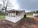 Charming exterior of a home featuring a screened-in porch perfect for outdoor relaxation at 512 Hall St, Salisbury, NC 28144