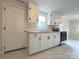 Clean white kitchen with wood countertops and stainless appliances at 512 Hall St, Salisbury, NC 28144