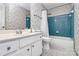 Bathroom featuring a single sink vanity with white cabinets, toilet, and a tiled shower at 6500 Wealdstone Ct, Mint Hill, NC 28227