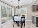 Bright dining area featuring backyard views and table set for a meal at 6500 Wealdstone Ct, Mint Hill, NC 28227