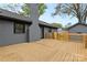 Spacious wood deck and backyard of this painted brick home at 7009 Wrentree Dr, Charlotte, NC 28210