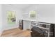 Bright laundry room with modern appliances, counter space, and natural light at 7009 Wrentree Dr, Charlotte, NC 28210