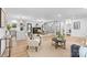 Bright and airy living room with a fireplace, modern accents, and hardwood floors throughout at 7009 Wrentree Dr, Charlotte, NC 28210