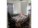 Modest bedroom with bed and a floral carpet at 7122 Pyramid Rd, Hickory, NC 28602