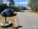 A view of the road and the mailbox, revealing the property's location and surroundings at 7122 Pyramid Rd, Hickory, NC 28602