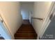 View of staircase leading to lower level, providing access to the home's various floors and levels at 7122 Pyramid Rd, Hickory, NC 28602