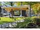 A park stage is designed as an open-air venue for performances and community events surrounded by lush greenery at 7710 Epping Forest Dr, Huntersville, NC 28078