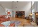 Spacious living room boasting a fireplace, tall ceilings, and lots of natural light at 7710 Epping Forest Dr, Huntersville, NC 28078